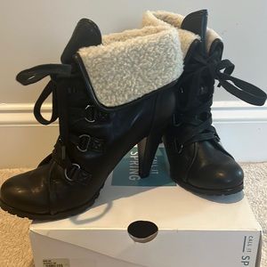 Call it Spring, black lace up  booties with fur lining on top.